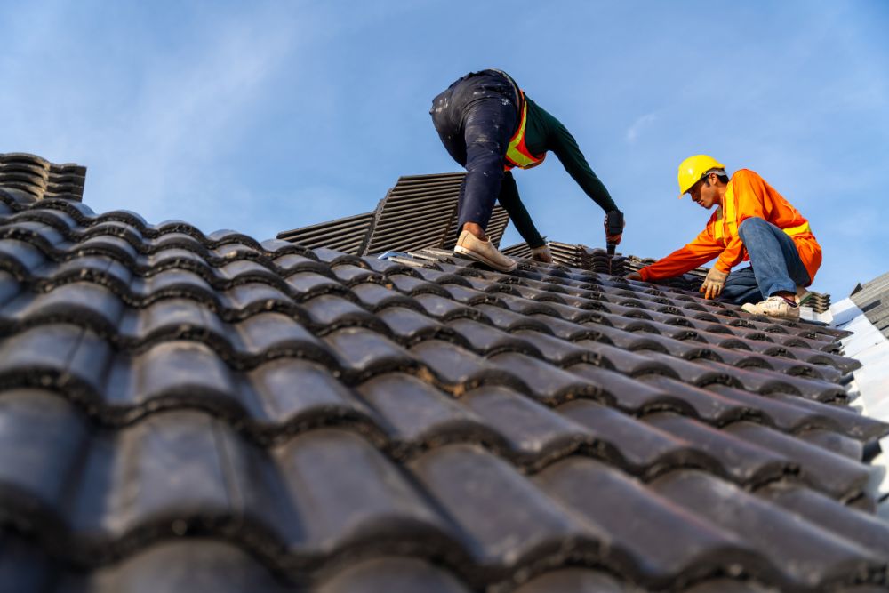 Roofing contractors installing tile roof – Anoka MN Roofing Services