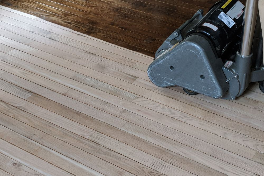 Oak Ridge Hardwood Floor Refinishing showing a polished wooden floor being restored