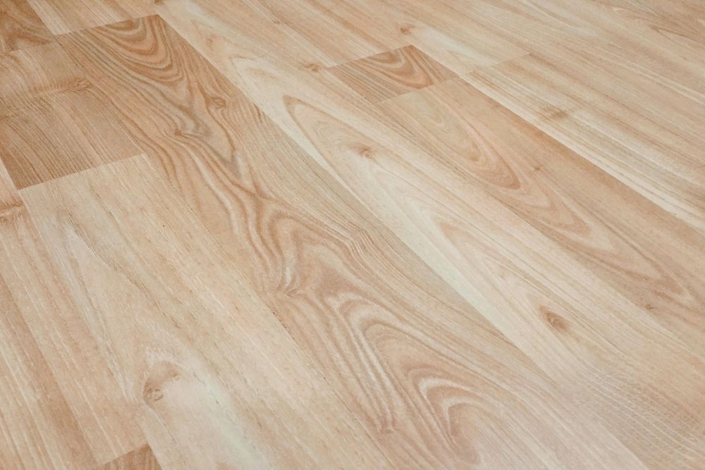 Close-up of Oak Ridge hardwood screen and recoat finish highlighting the natural grain and smooth satin sheen.