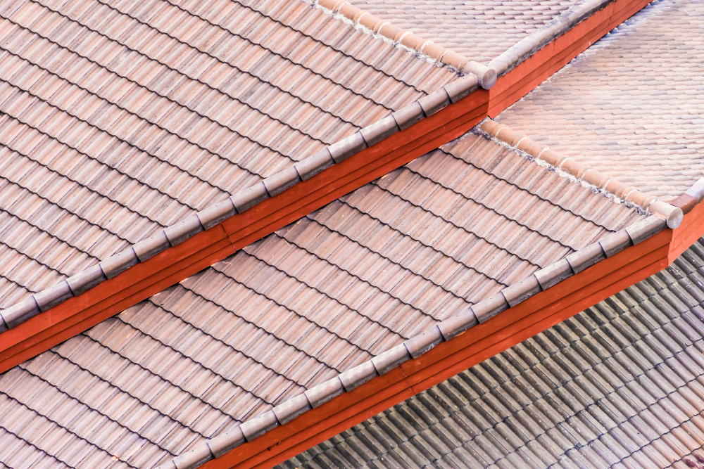 Detailed view of a multi-layered terracotta tile roof installed by Ramsey MN Roofing Services.
