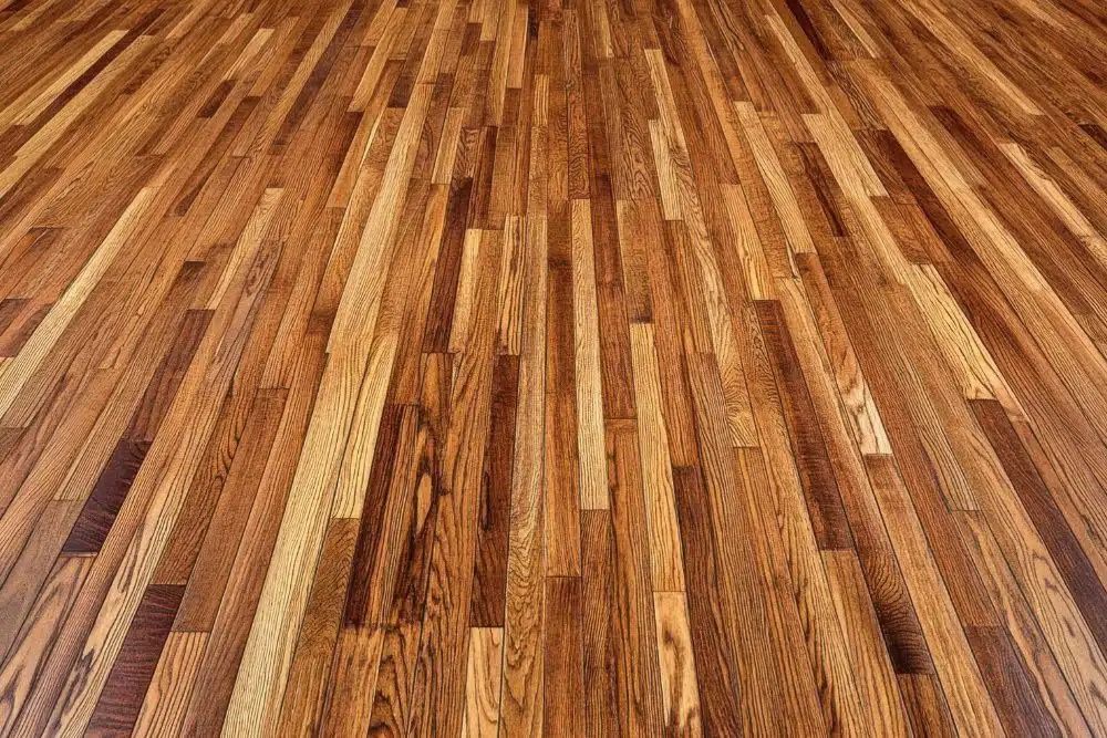 Professional hardwood floor polishing & maintenance Mercer Island featuring detailed oak wood grain textures.