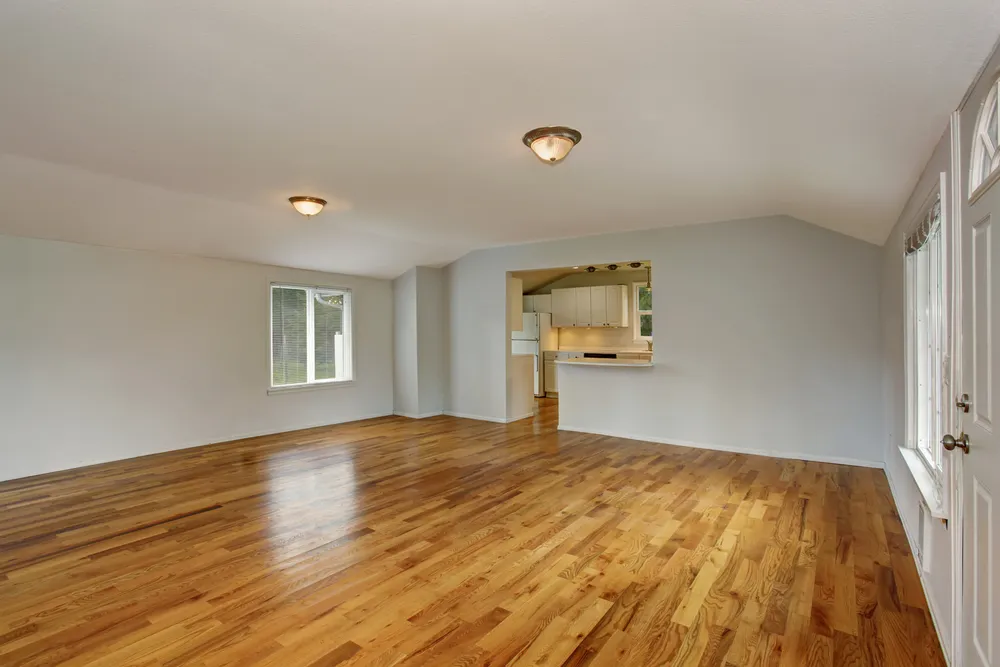 Professional Hardwood Floor Screen and Recoat Pineville NC by Good House Floor Care showcasing beautifully restored floors.