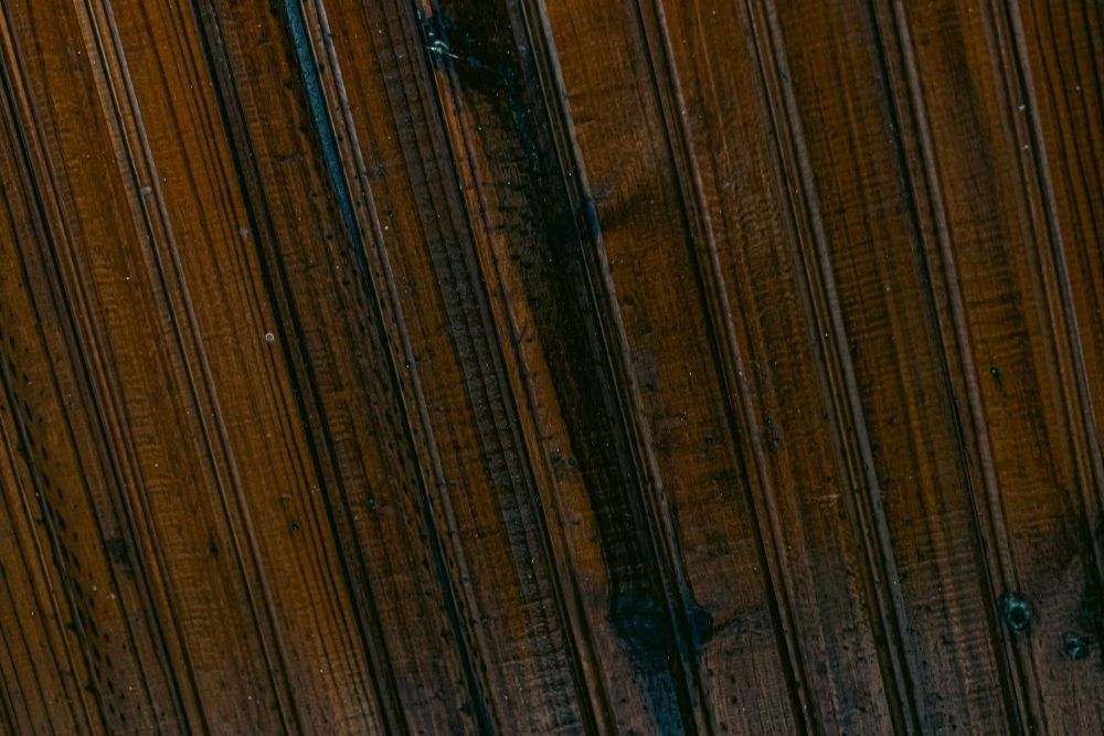 Close-up detail of rich wood grain after a professional hardwood screen and recoat Burlington service.