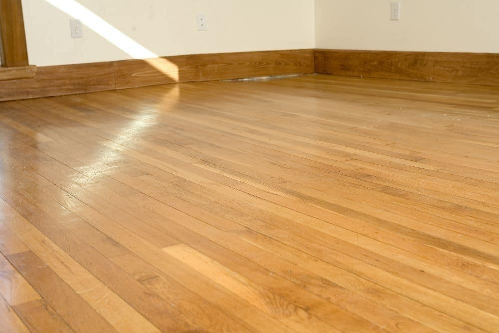 Clean, restored hardwood floors after professional wax removal Mill Creek WA.
