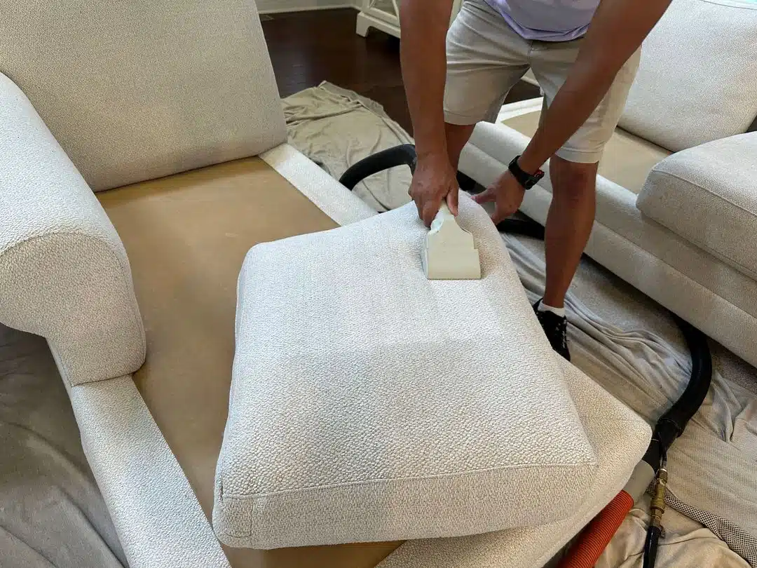 Upholstery Cleaning Montclair VA by Spotless Carpet Cleaning & Hardwood Floor Care using a professional steam extraction tool.