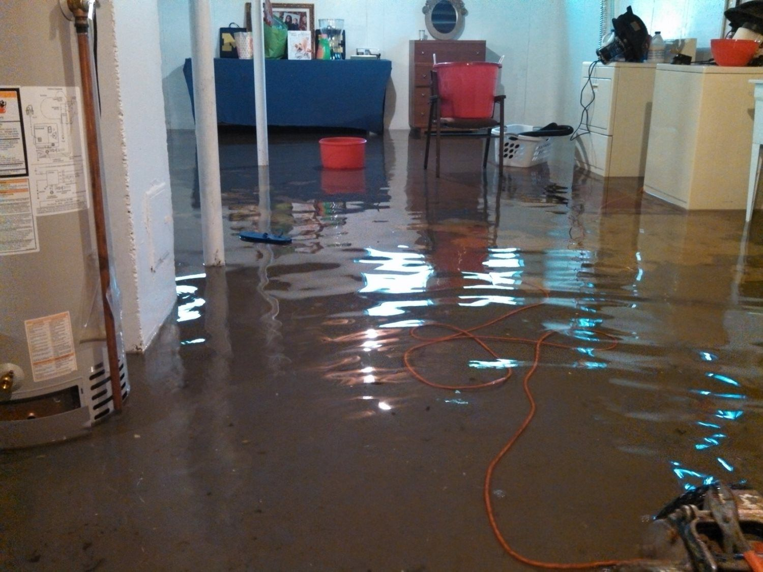 A flooded basement being restored by Premier Carpet Cleaning, the pros for Water Removal Services Colorado Springs CO.