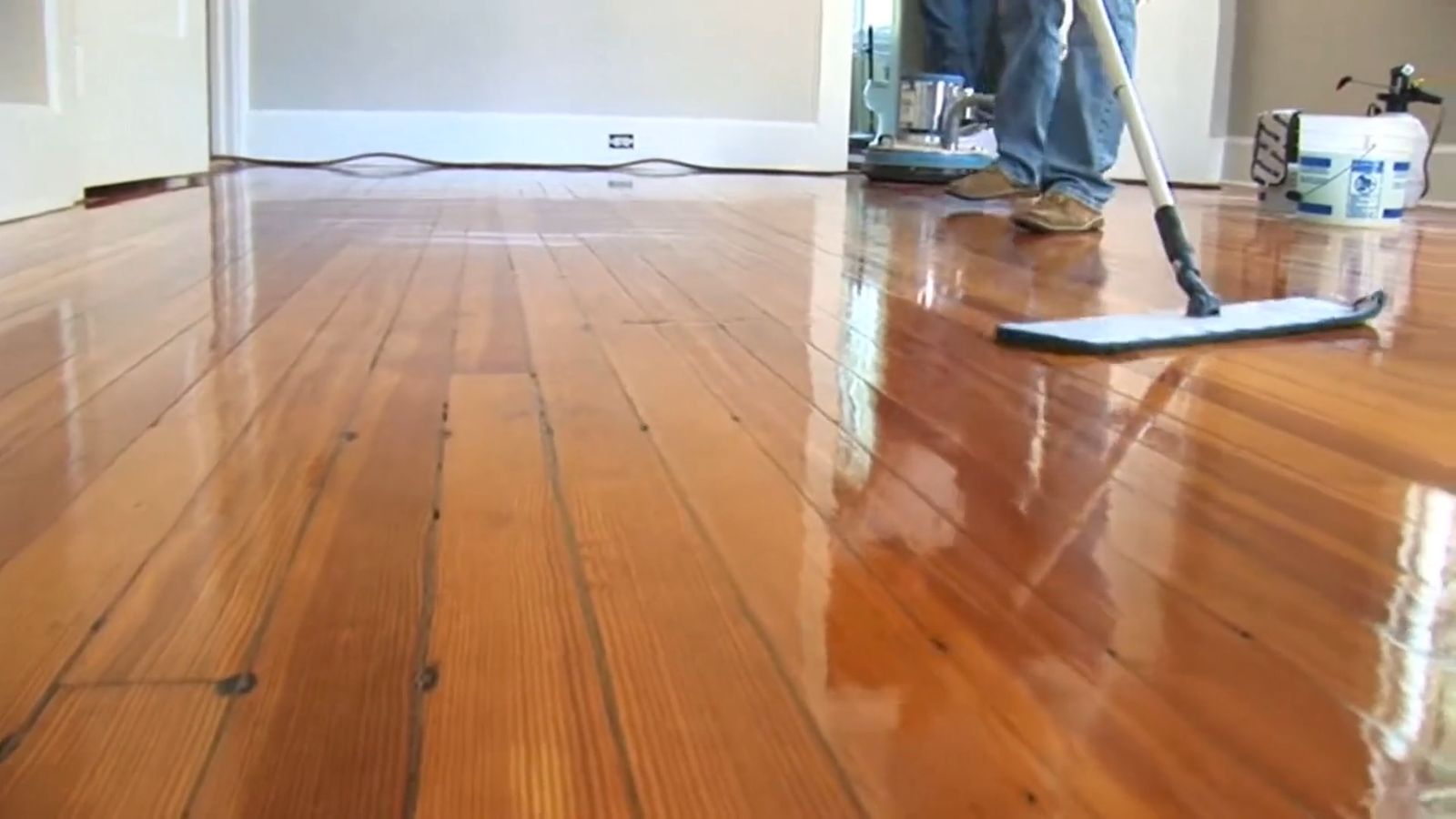Premier Carpet Cleaning: Professional Wood Floor Cleaning Colorado Springs CO results on high-gloss hardwood surfaces.