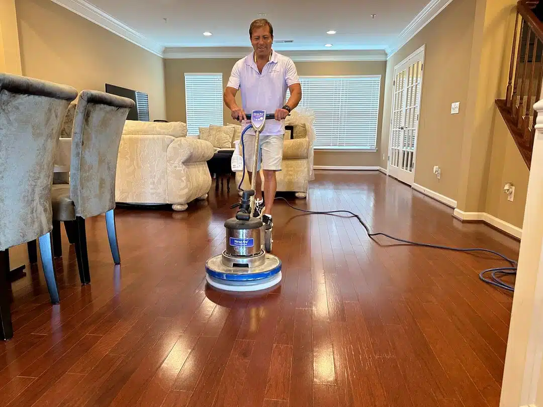 Professional Hardwood Floor Cleaning Woodbridge VA by Spotless Carpet Cleaning & Hardwood Floor Care using a buffer.