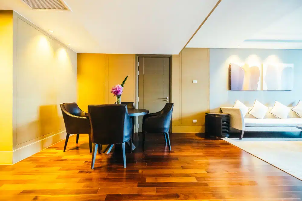 Elegant dark wood flooring in a modern home after expert Canton, GA hardwood floor refinishing.