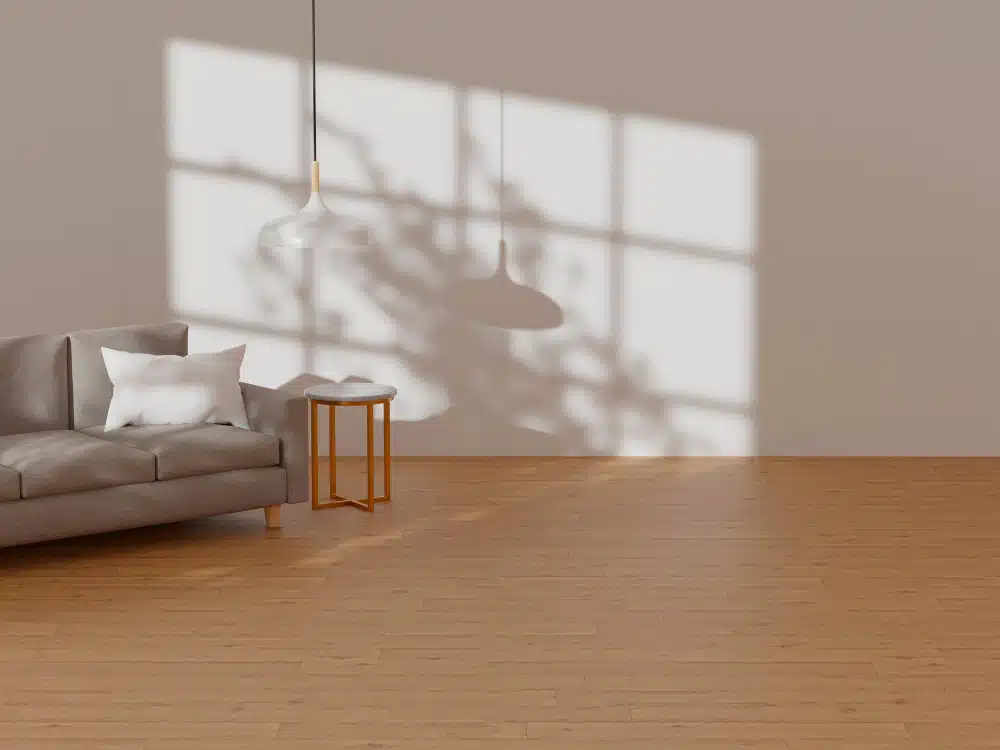 Professionally refinished hardwood floors in a modern Canton, GA living room with natural window lighting.