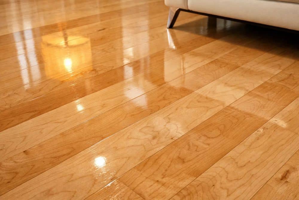 Close-up of a gleaming, light maple floor after Hardwood Floor Polishing & Maintenance Issaquah WA.