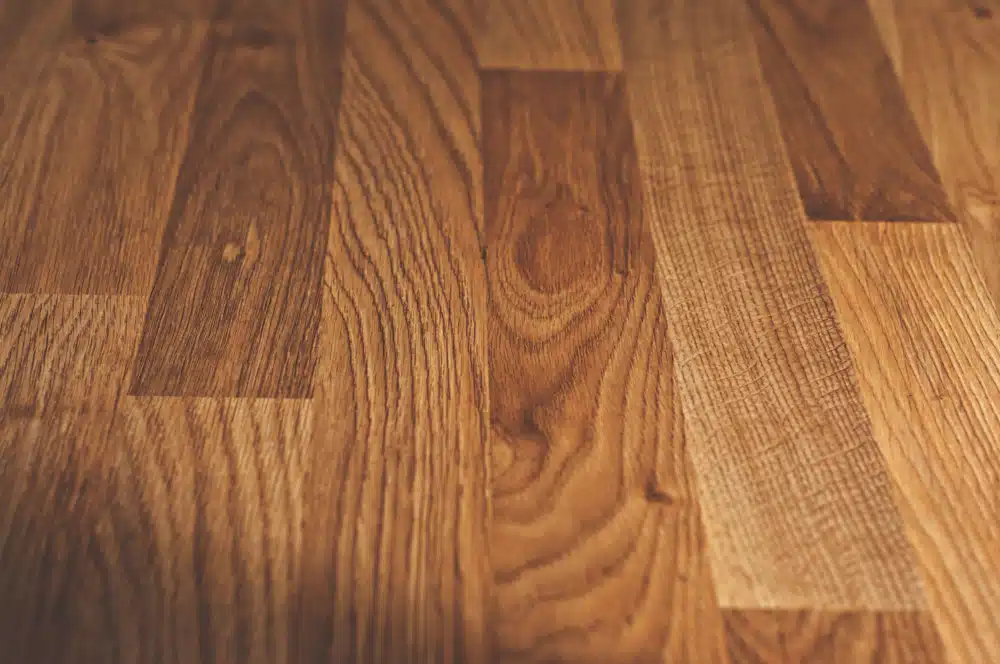 Johns Creek, GA Hardwood Floor Installation - close-up view of richly finished, traditional oak wood planks.
