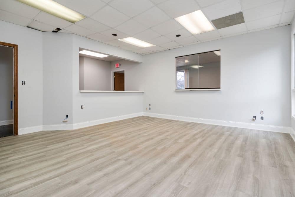 Completed North Atlanta GA Commercial Flooring Installation light wood plank office