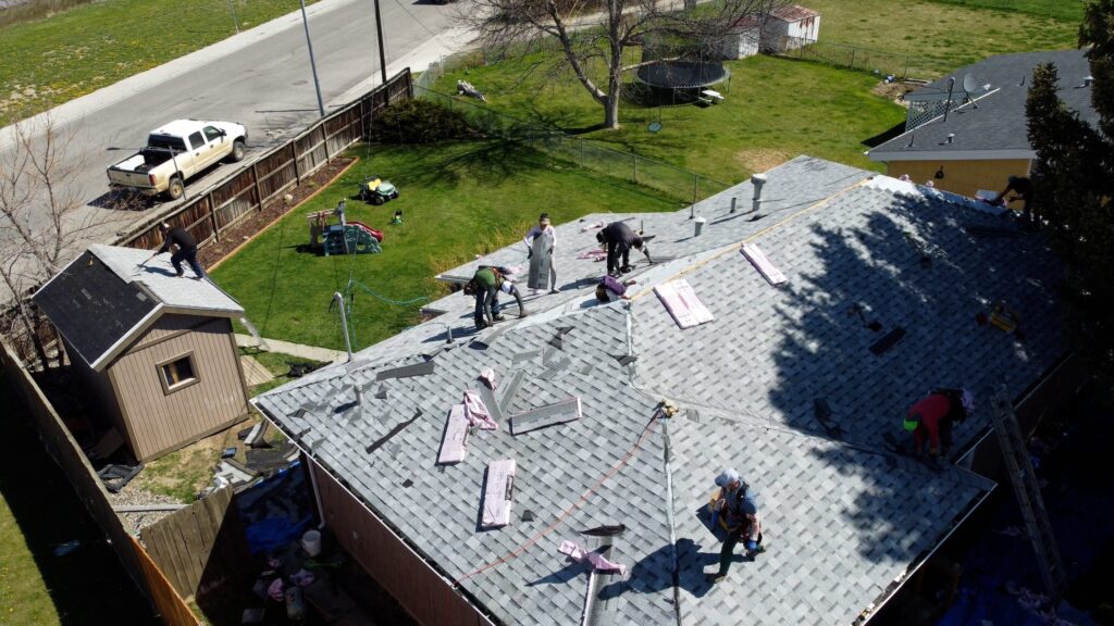 Aerial view of a professional crew from Wegner Roofing & Solar performing a Roof Replacement in Nashville, TN.
