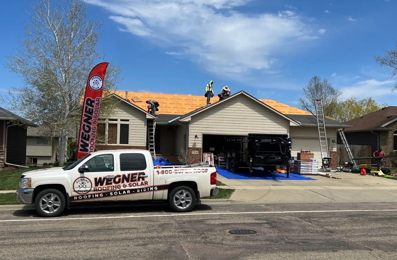 Professional crew from Wegner Roofing & Solar, one of the top Roofing Companies Franklin TN, installing a new shingle roof.